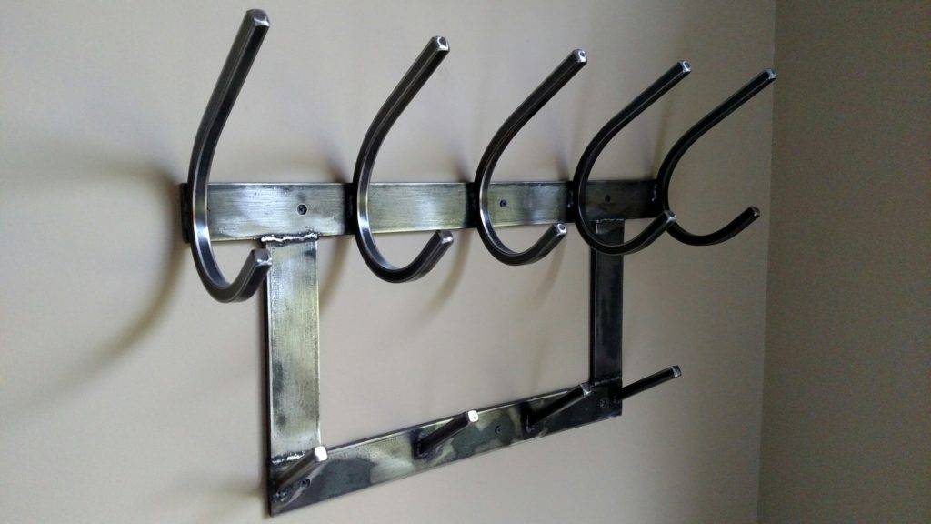 large curving J hooks for rustic, industrial wall rack