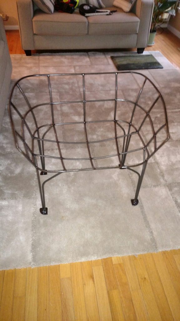 wild looking basket chair that required modification to the legs