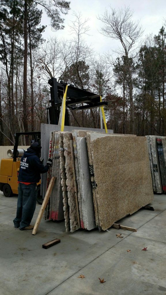 Steel I-beam granite boom lifting stone