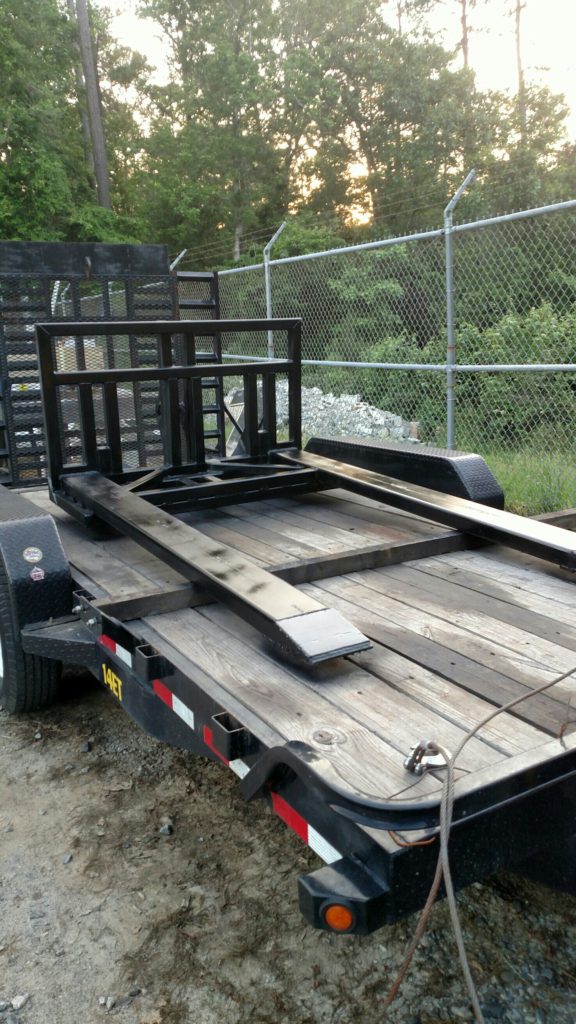 Front end loader forklift attachment for picking up salvage cars