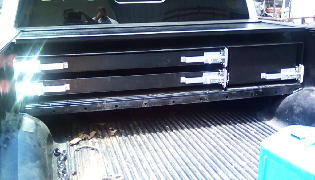 sub frame for supporting tool boxes in truck bed